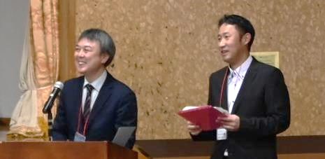 地域大交流会で発表する参加者